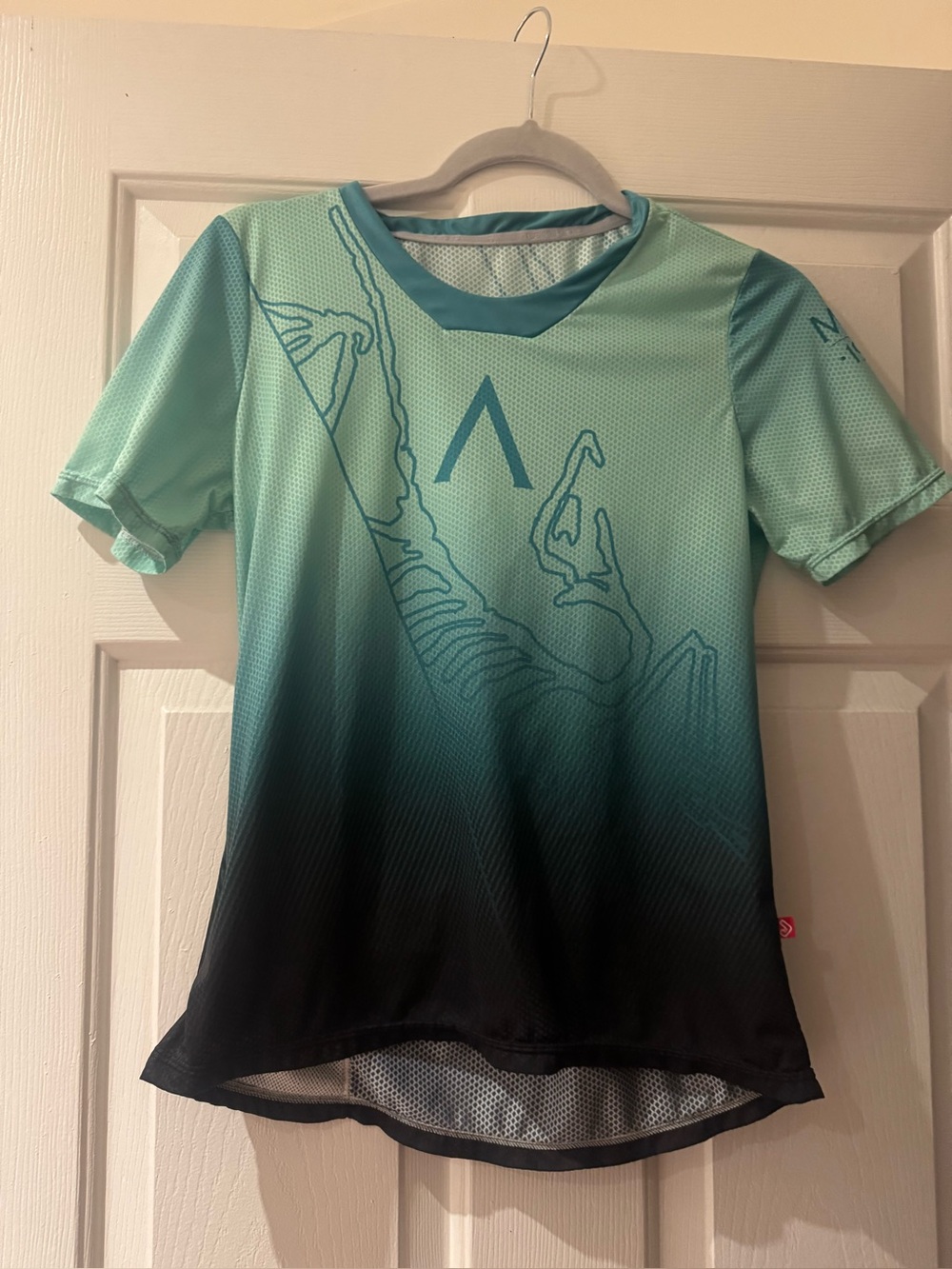 Jackaroo branded Arcteryx cycling top